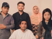 Shagufta Kausar and Shafqat Emmanuel with three of their children after being released from death row in Pakistan July 1, 2021